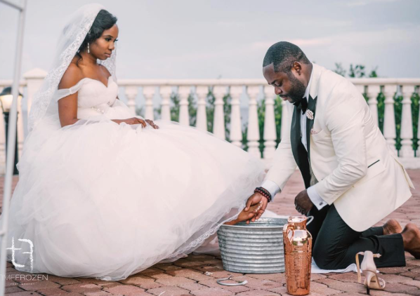 Black Wedding Moment Of The Day: This Photo Of A Groom Washing His Bride's Feet Is So Lovely

